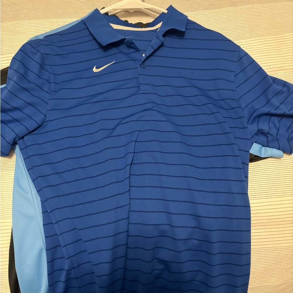 Nike Men's Blue Polo Shirt with Stripes